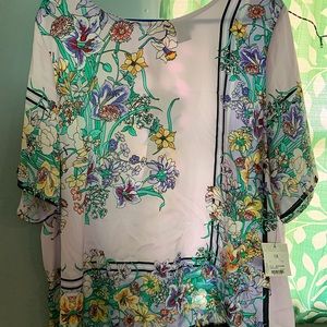 Nice lightweight top with tags
